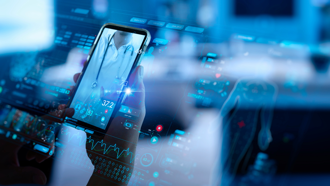 Telemedicine concept,Hand holding smartphone Medical Doctor online communicating the patient on VR medical interface with Internet consultation technology. Image Credit: Adobe Stock Images/greenbutterfly