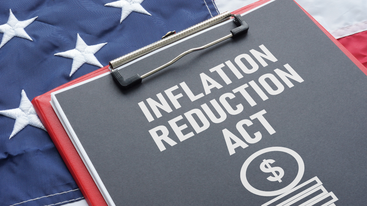 Inflation Reduction Act is shown using the text and the US flag | Image credit: © Andrii | AdobeStock: 527614812, stock.adobe.com