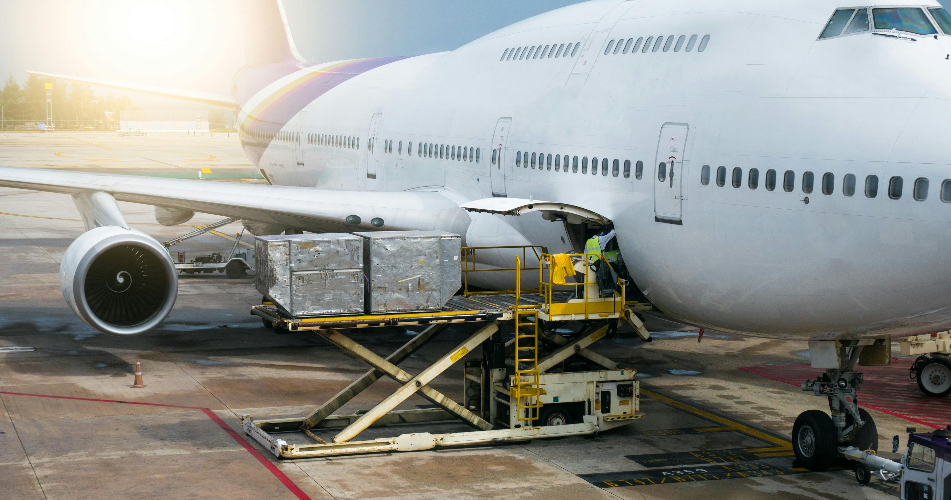 Preparing the aircraft before flight Loading of baggage. Food for flight check-in services and equipment to ready before boarding the airplane. Image Credit: Adobe Stock Images/boophuket