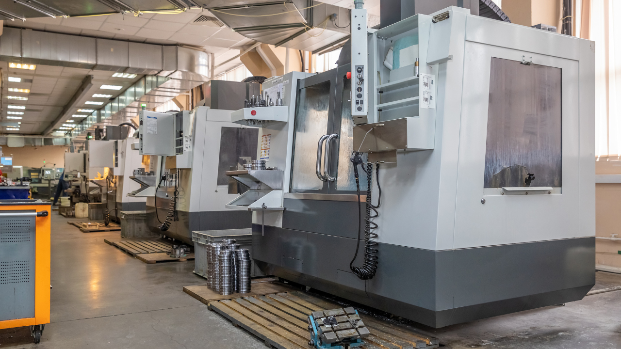 a number of CNC machines in the production room. Interior of industrial premises. Image Credit: Adobe Stock Images/Александр Ивасенко